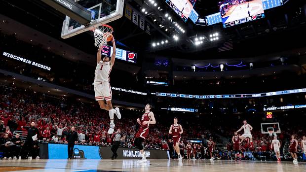 Johnny Davis throwing down a breakaway dunk against Colgate.
