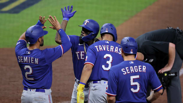 Oct 22, 2023; Houston, Texas, USA;Texas Rangers right fielder Adolis Garcia (53) reacts after hitting a grand slam against the Houston Astros in the ninth inning during game six of the ALCS for the 2023 MLB playoffs at Minute Maid Park. Mandatory Credit: Erik Williams-USA TODAY Sports  