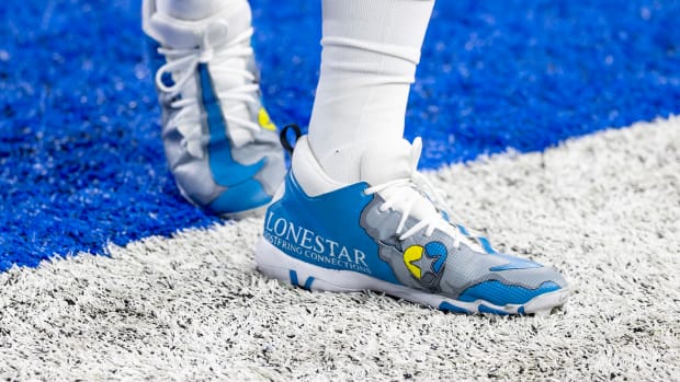 View of blue and grey cleats.