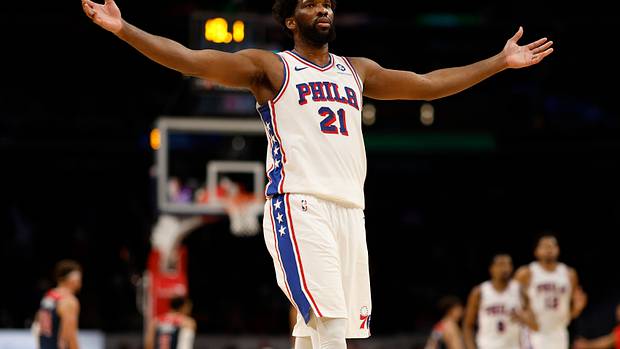 Philadelphia 76ers center Joel Embiid (21) celebrates after scoring his 50th point of the game against the Washington Wizards in the fourth quarter at Capital One Arena.