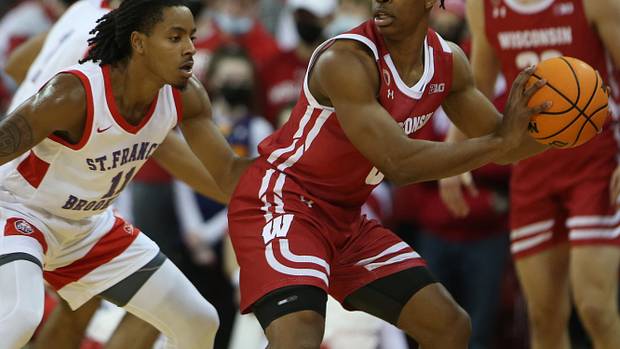 Wisconsin guard Jahcobi Neath with the basketball for in the post.
