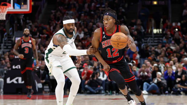 Dec 28, 2022; Chicago, Illinois, USA; Chicago Bulls guard Ayo Dosunmu drives to the basket against the Milwaukee Bucks