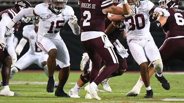 Alabama Crimson Tide linebacker Dallas Turner (15) and Alabama Crimson Tide linebacker Jihaad Campbell (30) put pressure on Mississippi State Bulldogs quarterback Will Rogers (2) in Davis Wade Stadium.