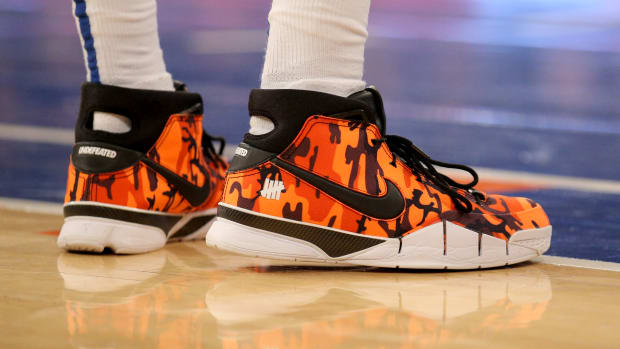 New York Knicks forward Julius Randle wears the Nike Kobe 1 Protro 'Undefeated Orange Camo (Phoenix)' sneakers. The Knicks hosted the Memphis Grizzlies on February 2, 2022.