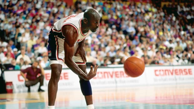 Team USA guard Michael Jordan passes the ball during the 1992 Summer Olympics.
