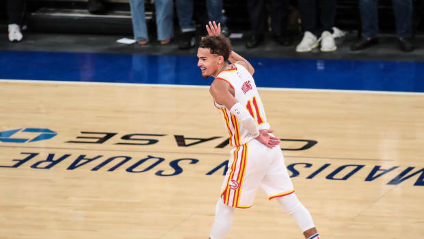 Jun 2, 2021; New York, New York, USA; Atlanta Hawks guard Trae Young (11) waves to the crowd after making a three point shot in against the New York Knicks in the fourth quarter during game five in the first round of the 2021 NBA Playoffs at Madison Square Garden.