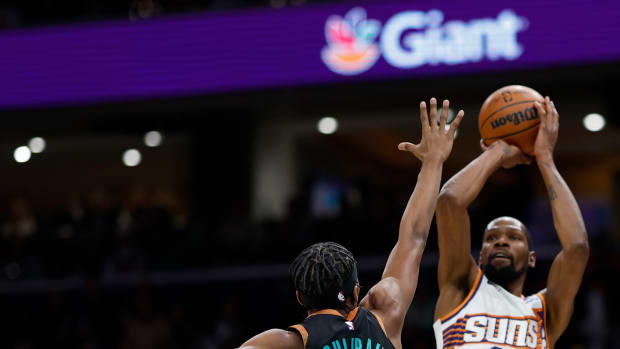 Phoenix Suns forward Kevin Durant (35) shoots the ball over Washington Wizards guard Bilal Coulibaly (0) in the first half at Capital One Arena.