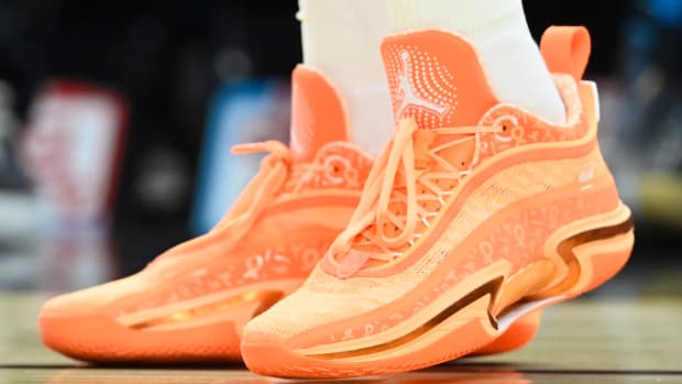 Cleveland Cavaliers guard Caris LeVert wears the Air Jordan 36 Low 'Orange PE' sneakers against the Orlando Magic on March 28, 2022.