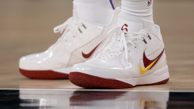 Los Angeles Lakers forward LeBron James' white and cardinal Nike sneakers.