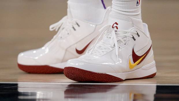 Los Angeles Lakers forward LeBron James' white and cardinal Nike sneakers.