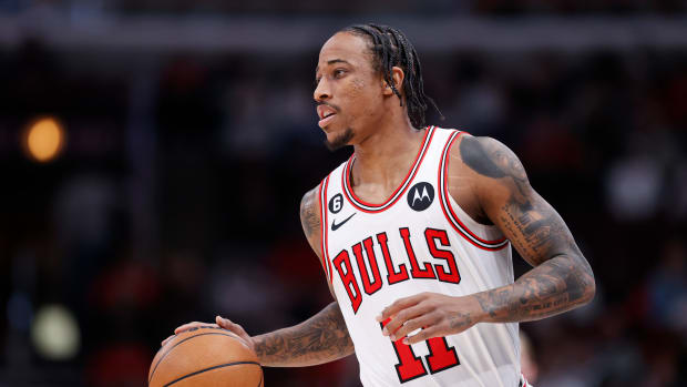 Dec 26, 2022; Chicago, Illinois, USA; Chicago Bulls forward DeMar DeRozan (11) brings the ball up court against the Houston Rockets during the first half at United Center.