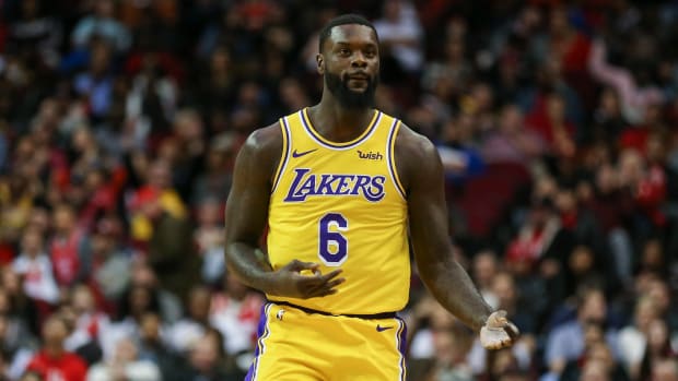Los Angeles Lakers guard Lance Stephenson (6) celebrates after making a basket during the fourth quarter against the Houston Rockets at Toyota Center.