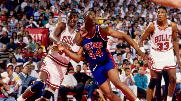 May 1989; Chicago,IL, USA: FILE PHOTO; Chicago Bulls forward Horace Grant (54) battles for position against Detroit Pistons forward Rick Mahorn (44) during the 1988-89 NBA Eastern Conference Finals at Chicago Stadium.