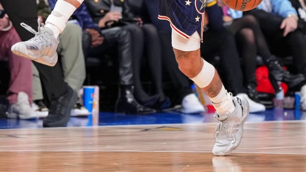 Trae Young's silver adidas sneakers worn in the 2024 NBA All-Star Game.