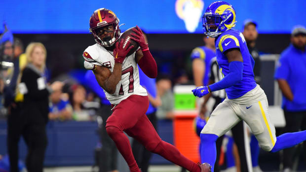 Washington Commanders wide receiver Terry McLaurin (17) catches a pass against the Los Angeles Rams during the second half at SoFi Stadium.