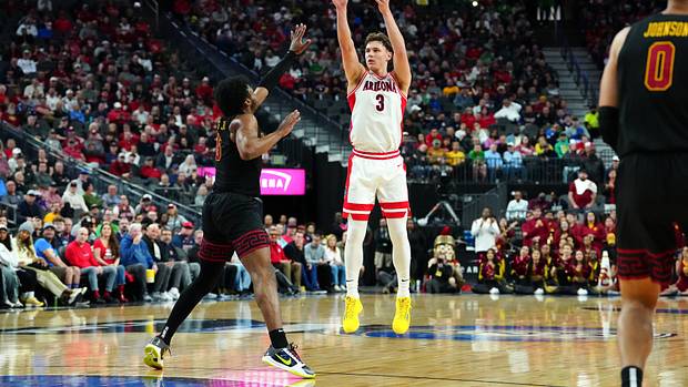 Arizona Wildcats guard Pelle Larsson shoots against USC Trojans guard Bronny James.