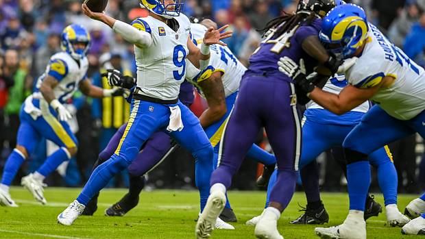 Rams QB Matthew Stafford attempting a pass against the Baltimore Ravens.