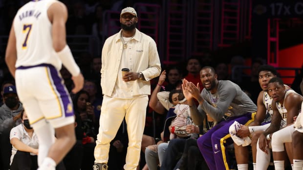 Los Angeles Lakers forward LeBron James cheers for his team during a game.
