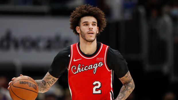 Chicago Bulls guard Lonzo Ball dribbles the ball up the court.