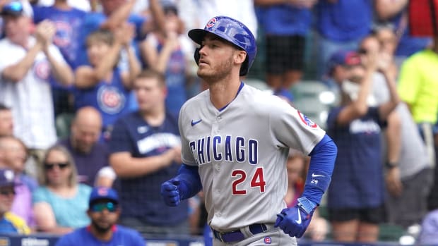 Jul 6, 2023; Milwaukee, Wisconsin, USA; Chicago Cubs center fielder Cody Bellinger (24) hits a two-run home run during the sixth inning against the Milwaukee Brewers at American Family Field. Mandatory Credit: Kayla Wolf-USA TODAY Sports