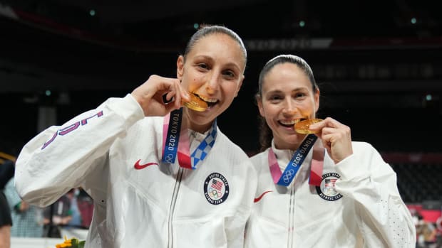 Diana Taurasi and Sue Bird celebrate after winning the gold medal at the Tokyo Olympics.