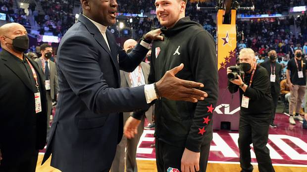 Michael Jordan and Luka Doncic share a moment at NBA All-Star Weekend in Cleveland during the 2021-22 season.