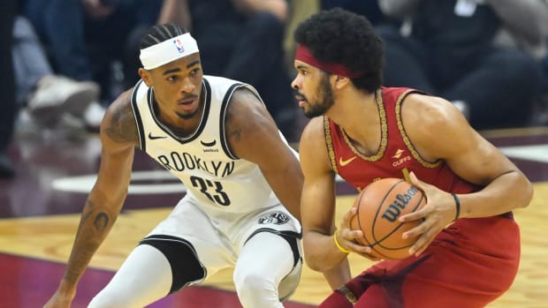 Mar 10, 2024; Cleveland, Ohio, USA; Brooklyn Nets center Nic Claxton (33) defends Cleveland Cavaliers center Jarrett Allen (31) in the first quarter at Rocket Mortgage FieldHouse. Mandatory Credit: David Richard-USA TODAY Sports