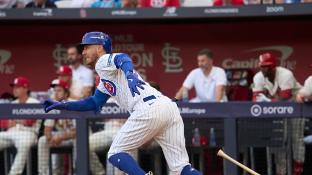 Jun 24, 2023; London, GBR, ENG; Chicago Cubs center fielder Cody Bellinger (24) runs out a single in the fifth inning against the St. Louis Cardinals in the fifth inning of the London series at London Stadium. Mandatory Credit: Peter van den Berg-USA TODAY Sports