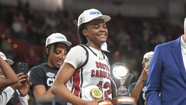 South Carolina guard MiLaysia Fulwiley (12) holds the MVP trophy after South Carolina beat LSU for the SEC Women's Basketball Tournament Championship at the Bon Secours Wellness Arena in Greenville, S.C. Sunday, March 10, 2024.  