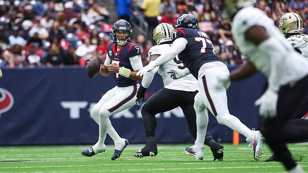 Houston Texans quarterback C.J. Stroud (7) looks for an open receiver during the second quarter against the New Orleans Saints at NRG Stadium.