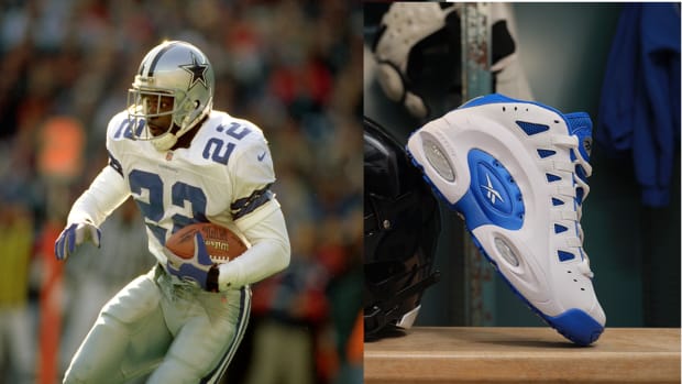 Dallas Cowboys running back Emmitt Smith next to his Reebok sneakers.