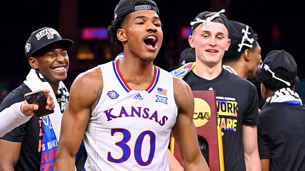 Kansas Jayhawks guard Ochai Agbaji (30) celebrates their win against the North Carolina Tar Heels in the 2022 NCAA men's basketball tournament Final Four championship game at Caesars Superdome.