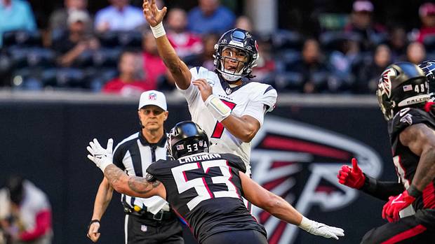 Stroud attempts a pass against the Atlanta Falcons.