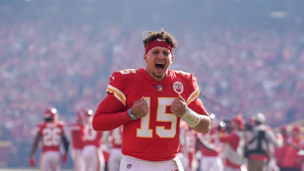 Patrick Mahomes cheers on fans before a game.
