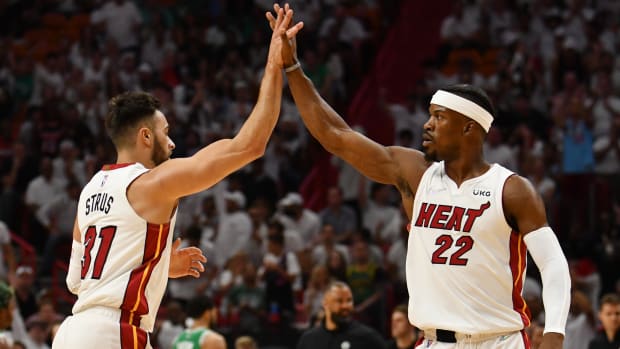 May 19, 2022; Miami, Florida, USA; Miami Heat guard Max Strus (31) celebrates with forward Jimmy Butler (22) after a basket during the first half of game two of the 2022 eastern conference finals against the Boston Celtics