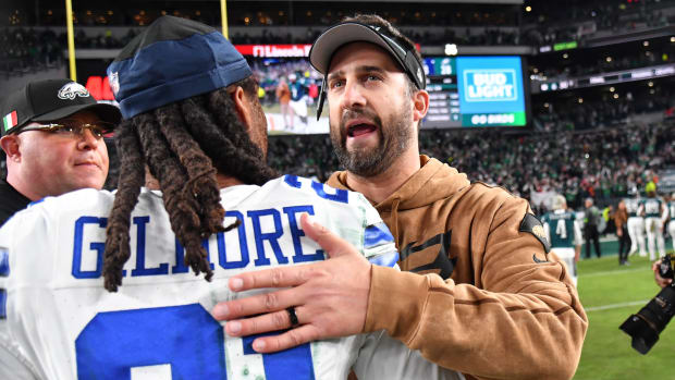 Philadelphia Eagles head coach Nick Sirianni meets with Dallas Cowboys cornerback Stephon Gilmore (21) after Eagles win at Lincoln Financial Field.