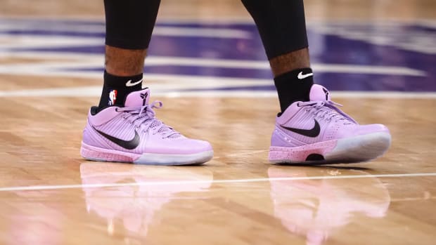Sacramento Kings guard Davion Mitchell wears the Nike Kobe 5 Protro.
