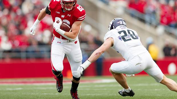 Wisconsin tight end Jack Eschenbach breaks a tackle against Northwestern.