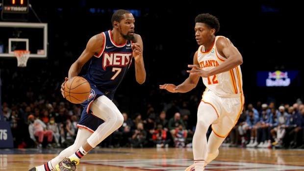 Brooklyn Nets forward Kevin Durant (7) drives to the basket against Atlanta Hawks forward De'Andre Hunter (12) during the third quarter at Barclays Center.