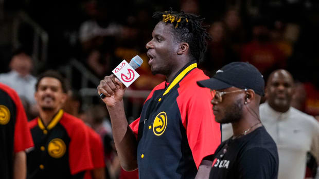 Apr 6, 2022; Atlanta, Georgia, USA; Atlanta Hawks center Clint Capela (15) talks to the fans prior to the game against the Washington Wizards at State Farm Arena.