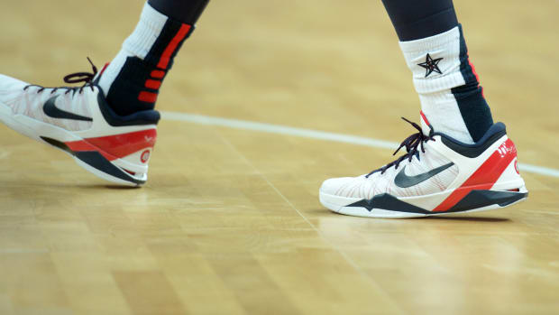 View of Team USA guard Kobe Bryant's red, white, and blue Nike shoes in the 2012 Summer Olympics.
