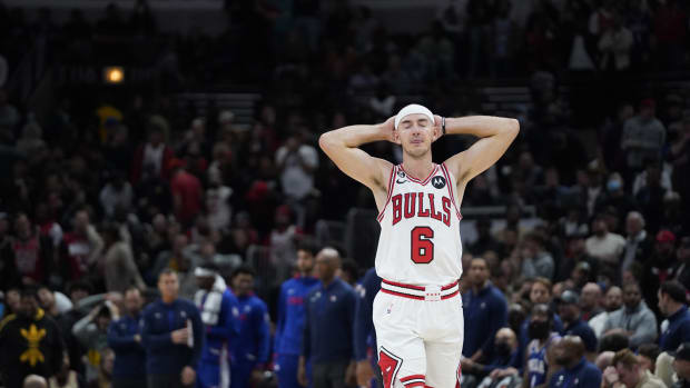 Chicago Bulls guard Alex Caruso (6) reacts after missing a three point basket