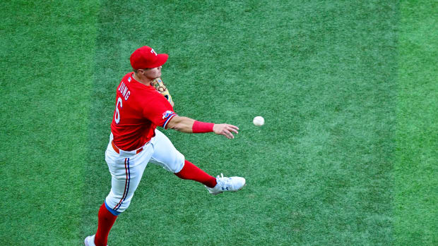 Sep 9, 2022; Arlington, Texas, USA; Texas Rangers third baseman Josh Jung (6) throws the ball to first base during the first inning against the Toronto Blue Jays at the Globe Life Field. Mandatory Credit: Jerome Miron-USA TODAY Sports
