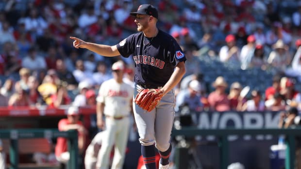 Sep 10, 2023; Anaheim, California, USA; Cleveland Guardians starting pitcher Tanner Bibee (61) gestures after a strikeout during the seventh inning against the Los Angeles Angels at Angel Stadium. Mandatory Credit: Jessica Alcheh-USA TODAY Sports