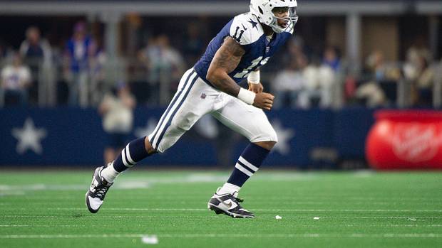 Dallas Cowboys linebacker Micah Parsons runs onto the field.