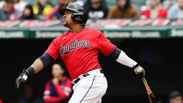 Apr 23, 2023; Cleveland, Ohio, USA; Cleveland Guardians third baseman Jose Ramirez (11) hits a home run during the third inning against the Miami Marlins at Progressive Field. Mandatory Credit: Ken Blaze-USA TODAY Sports