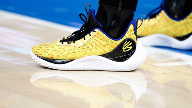 View of Stephen Curry's yellow and black shoes.