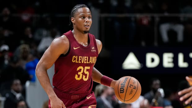 Oct 10, 2023; Atlanta, Georgia, USA; Cleveland Cavaliers forward Isaac Okoro (35) brings the ball up the court against the Atlanta Hawks during the second half at State Farm Arena.