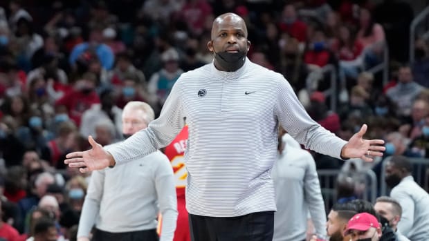 Dec 29, 2021; Chicago, Illinois, USA; Atlanta Hawks head coach Nate McMillan gestures to his team during the first half at United Center.