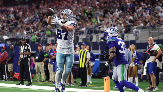 Nov 30, 2023; Arlington, Texas, USA; Dallas Cowboys tight end Jake Ferguson (87) catches a pass for a touchdown during the second half against the Seattle Seahawks at AT&T Stadium. Mandatory Credit: Tim Heitman-USA TODAY Sports
